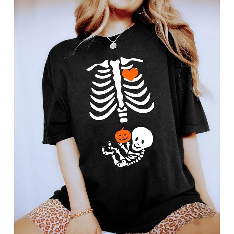 Skeleton Halloween Maternity Shirt, Funny Pregnancy Announcement 2024 Shirt, Pregnant Women Costume, Fall New Mom...